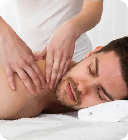 A person enjoying a massage combo treatment, combining multiple massage techniques for full relaxation.